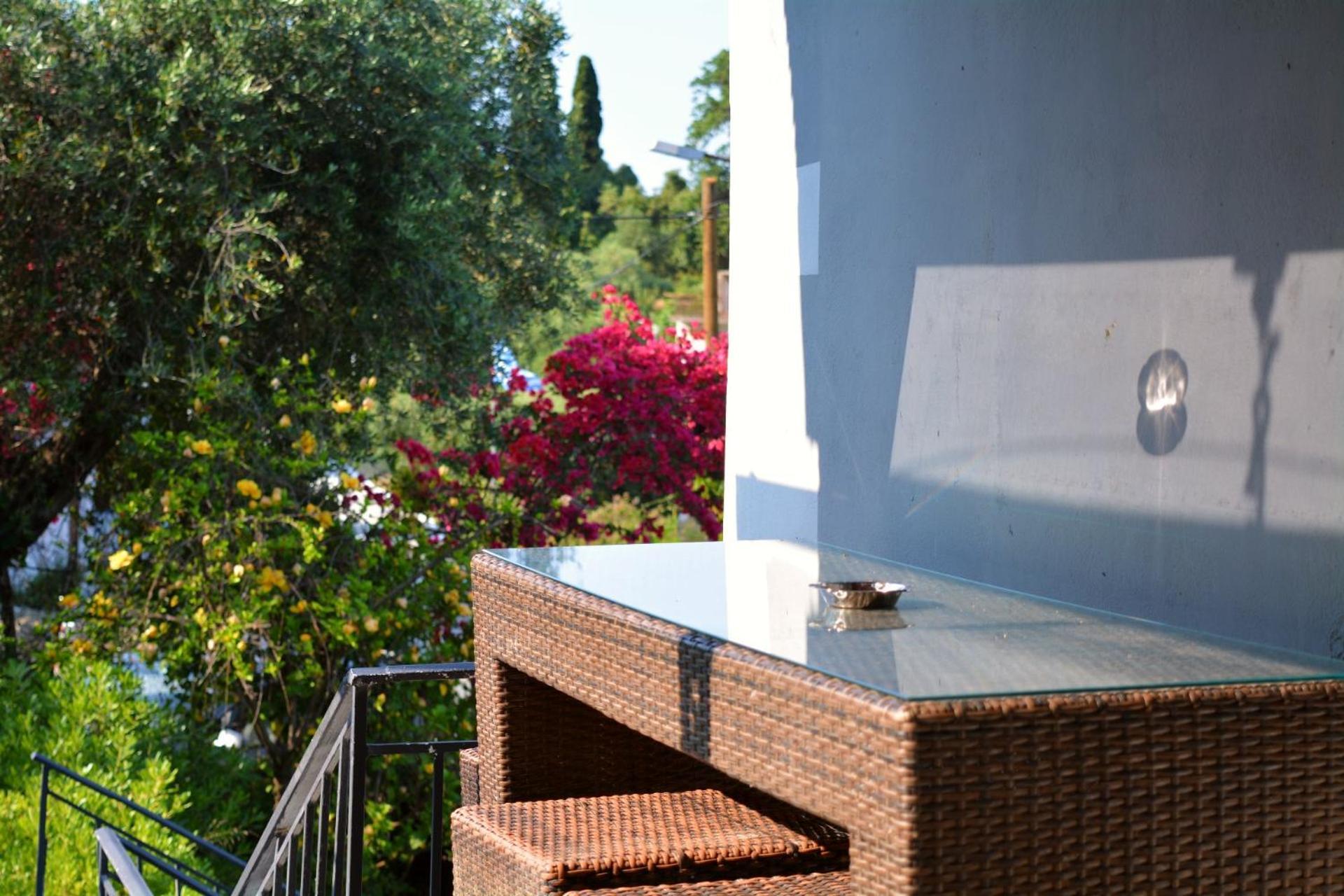 Afroditi First Floor Apartment Achílleion Exterior photo